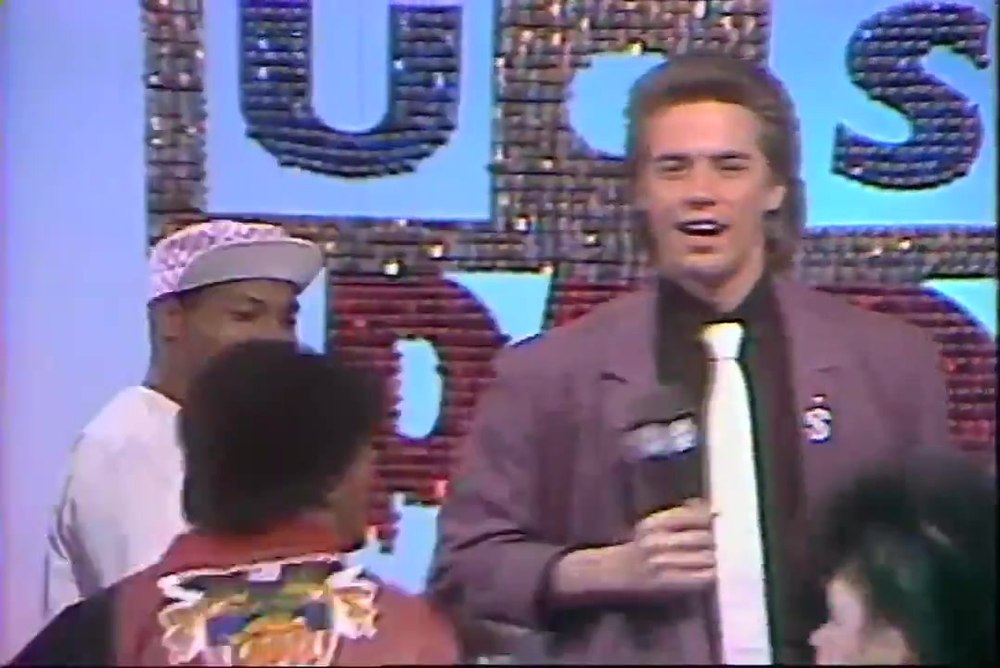 A host works the Dance Party USA studio crowd, late 1980s